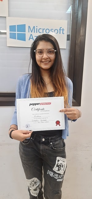 Pepper Animation student holding a course completion certificate